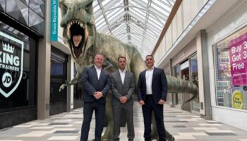 T Rex with business people